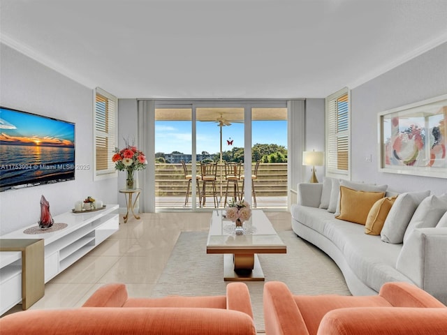 living room with expansive windows and tile patterned floors