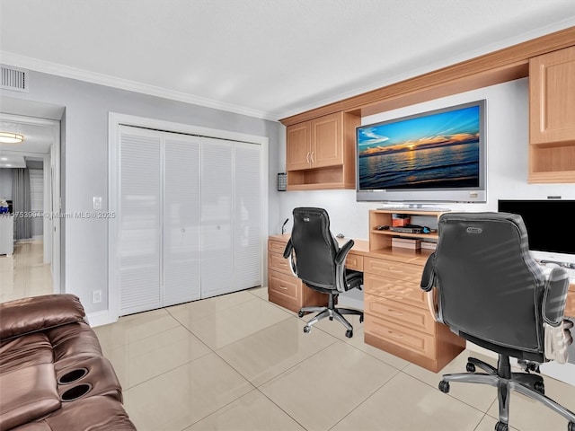 home office with ornamental molding, visible vents, and light tile patterned floors