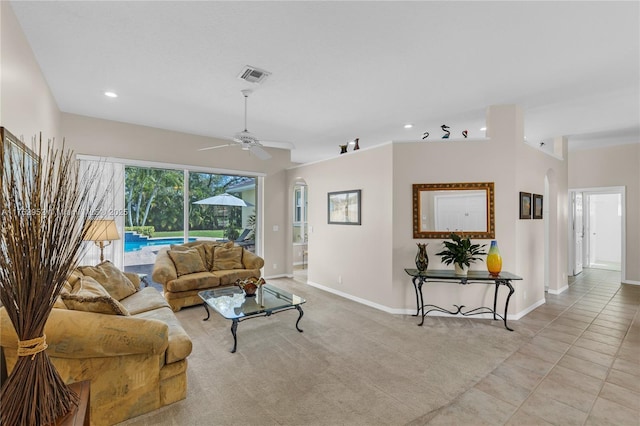 living area with recessed lighting, visible vents, ceiling fan, and baseboards