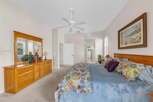 bedroom with visible vents, multiple windows, baseboards, and carpet flooring