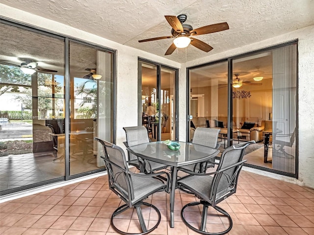 sunroom with a ceiling fan