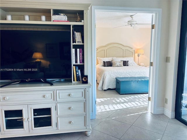 bedroom featuring light tile patterned floors