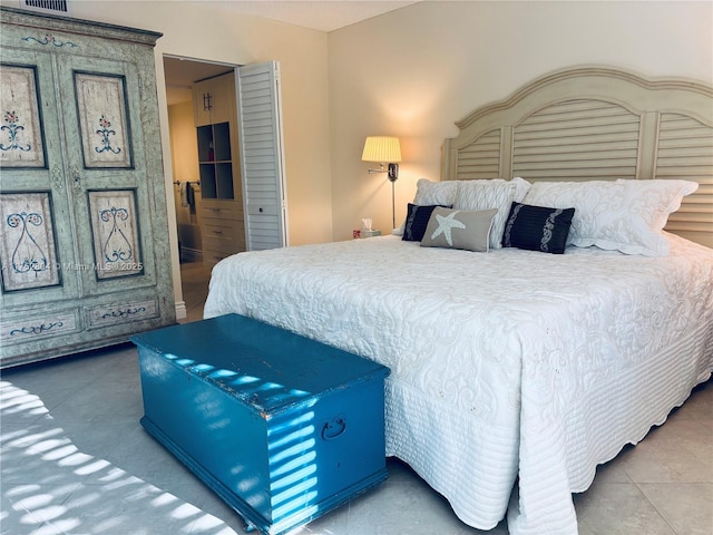 tiled bedroom with visible vents