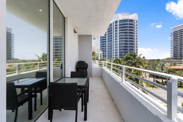 balcony featuring a sunroom