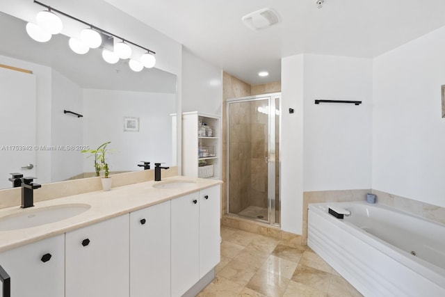 full bathroom featuring a stall shower, visible vents, and a sink