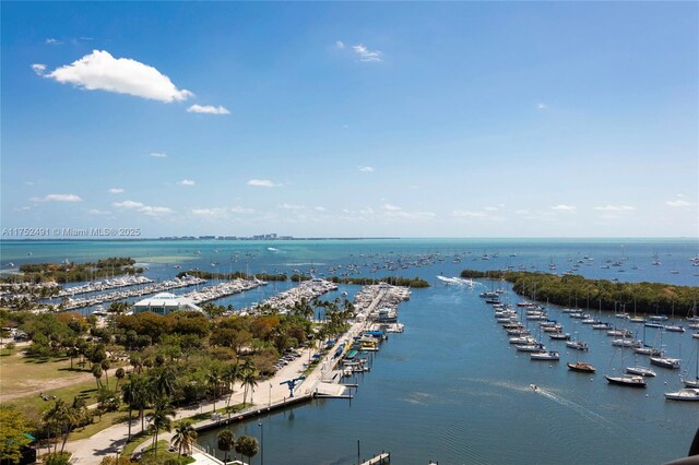birds eye view of property featuring a water view