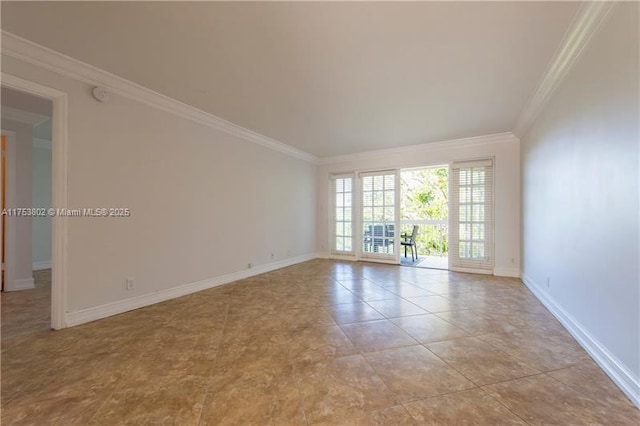 unfurnished room with light tile patterned floors, ornamental molding, and baseboards