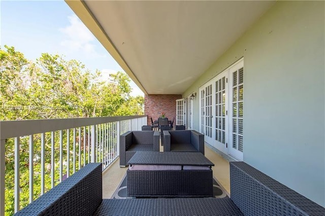 balcony featuring french doors