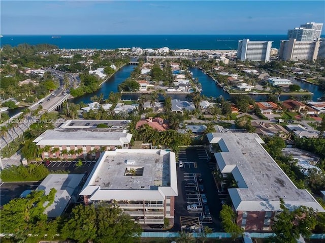 birds eye view of property featuring a water view