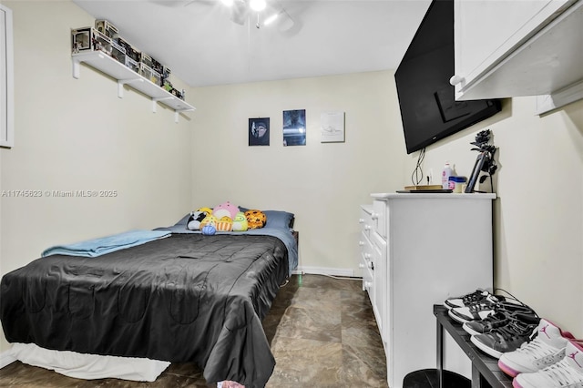 bedroom featuring baseboards