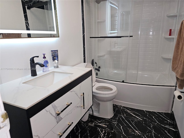 full bath featuring marble finish floor, enclosed tub / shower combo, vanity, and toilet