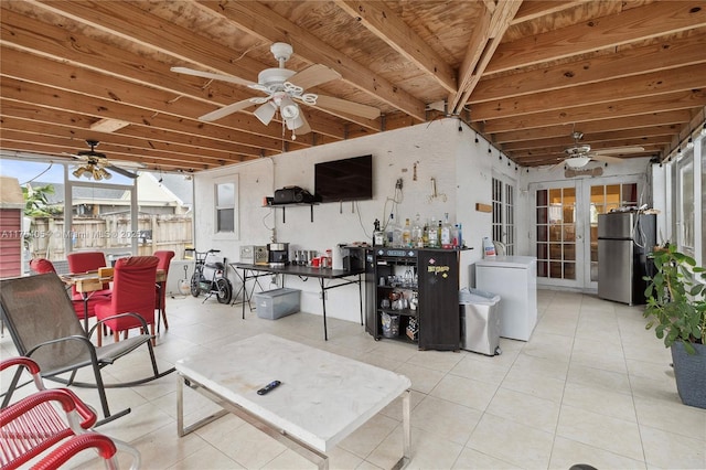 view of patio / terrace with french doors and a ceiling fan