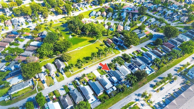 birds eye view of property with a residential view