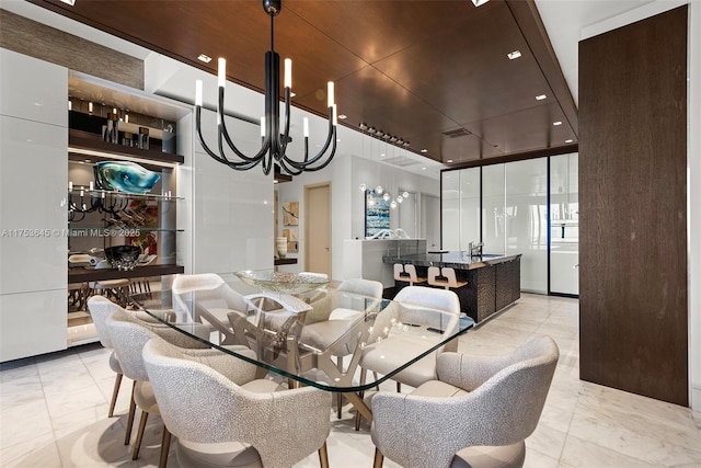 dining space featuring a chandelier