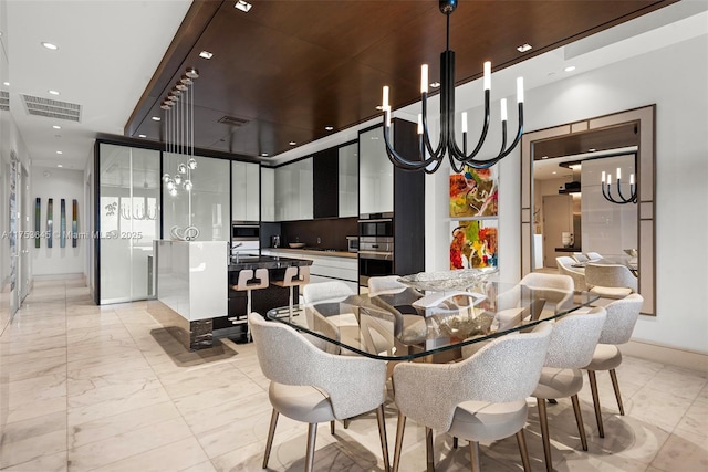 dining space with marble finish floor, visible vents, and recessed lighting