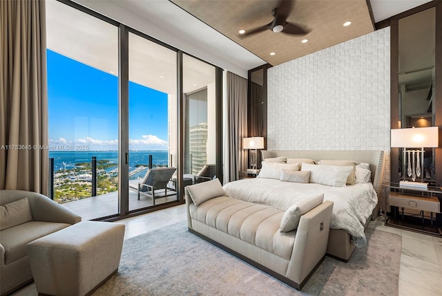 bedroom with recessed lighting, brick wall, a ceiling fan, access to outside, and expansive windows