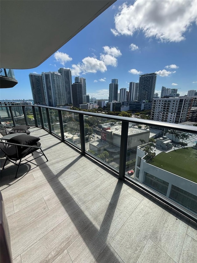 balcony featuring a view of city