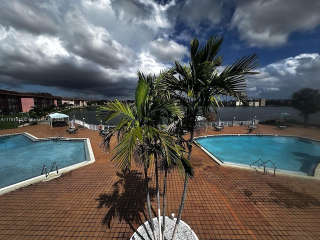 community pool with a patio