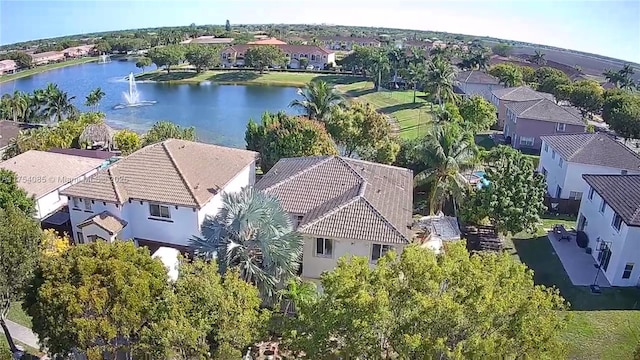 aerial view with a water view and a residential view