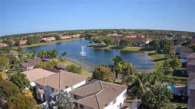 birds eye view of property with a residential view and a water view
