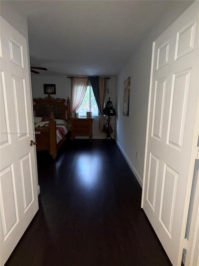 bedroom featuring baseboards