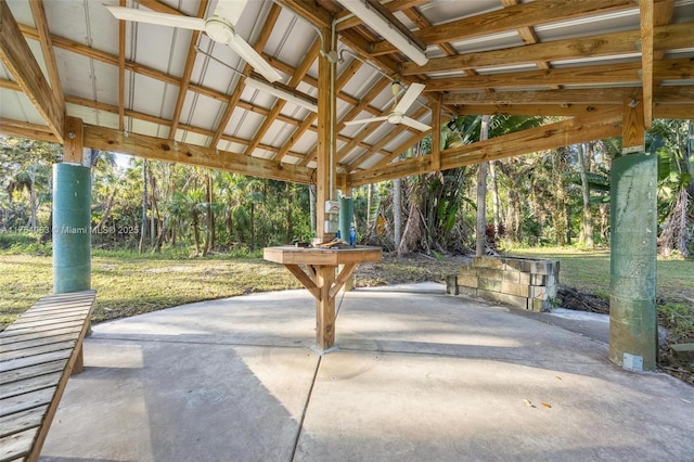 view of patio featuring a forest view