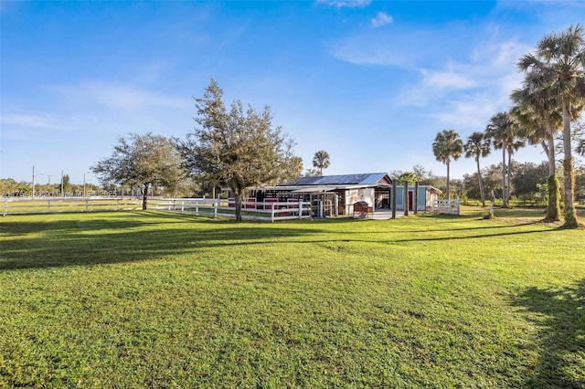 view of yard with an outdoor structure