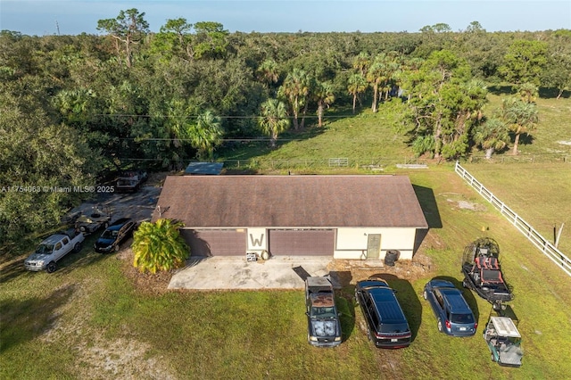 aerial view with a wooded view