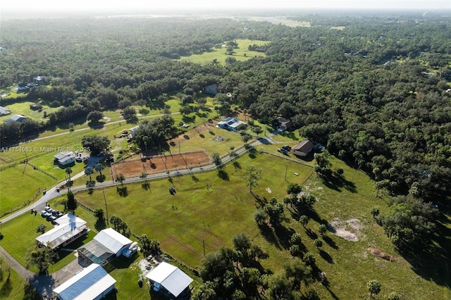 aerial view featuring a rural view and a forest view