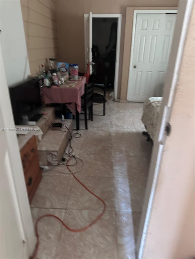 interior space featuring light tile patterned floors