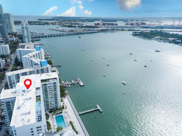 drone / aerial view with a water view and a view of city