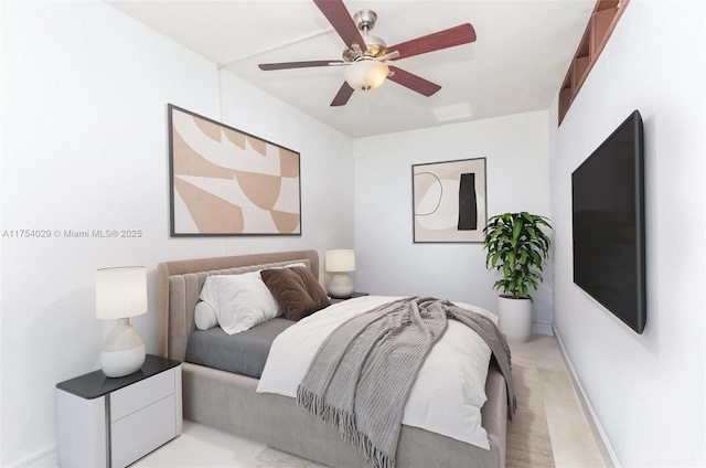 bedroom featuring light carpet, ceiling fan, and baseboards