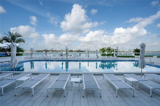 community pool with a patio