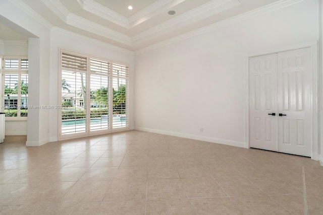 empty room featuring light tile patterned floors, crown molding, baseboards, and recessed lighting