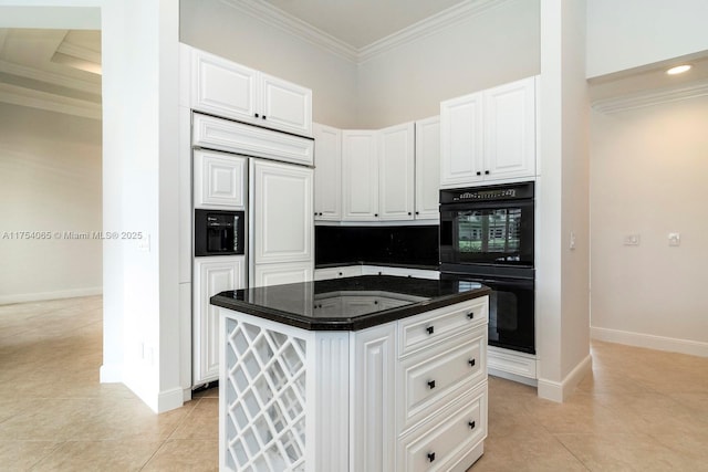 kitchen featuring light tile patterned floors, dobule oven black, and crown molding
