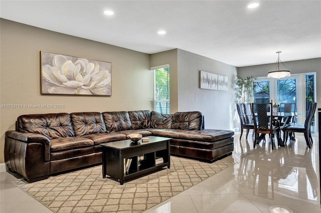 living room featuring light tile patterned floors and recessed lighting