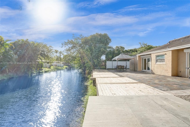 view of dock with a water view