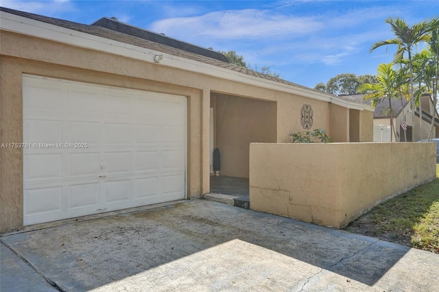 garage with driveway