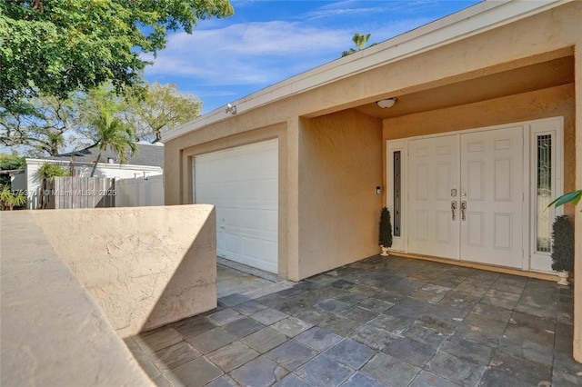 garage featuring fence