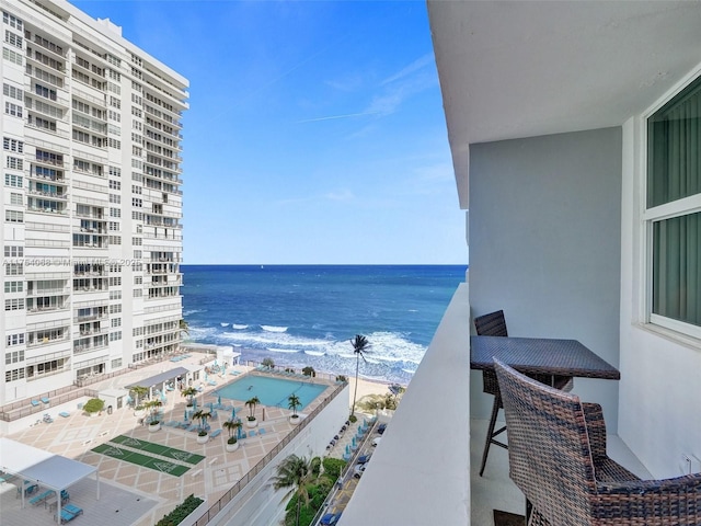 balcony featuring a water view