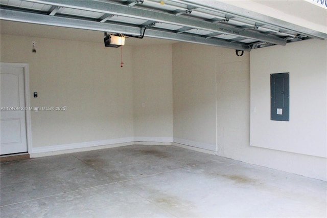 garage featuring electric panel and a garage door opener