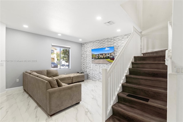 living area featuring recessed lighting, visible vents, baseboards, stairs, and marble finish floor