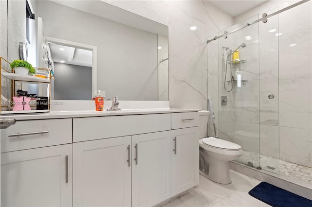 bathroom featuring marble finish floor, vanity, a marble finish shower, and toilet