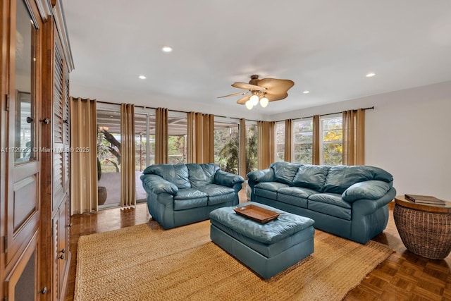 living area featuring a ceiling fan and recessed lighting