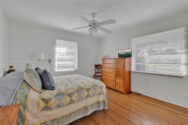177 NE 109th St, Miami Shores, FL 33161 - bedroom featuring light wood-style floors and a ceiling fan
