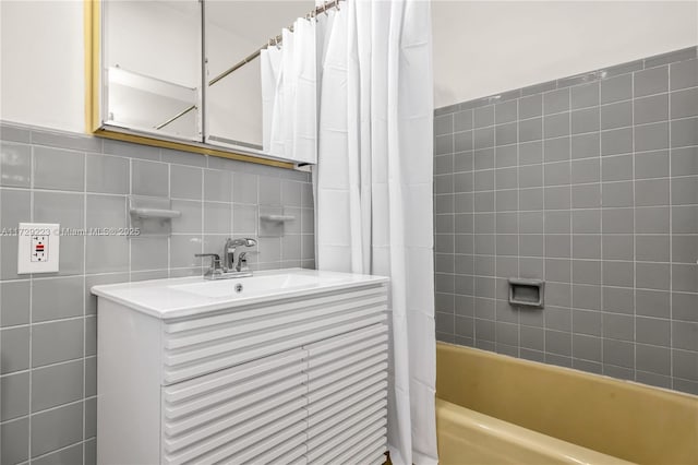 177 NE 109th St, Miami Shores, FL 33161 - full bathroom with shower / bath combo, tile walls, and vanity