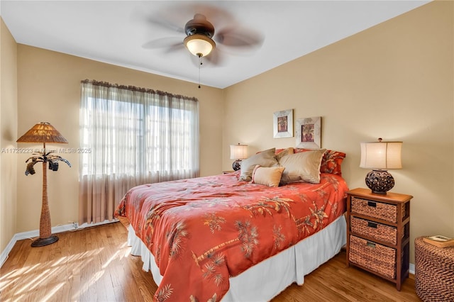 177 NE 109th St, Miami Shores, FL 33161 - bedroom with wood finished floors and a ceiling fan