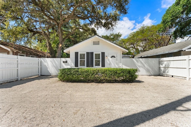 exterior space with a fenced backyard