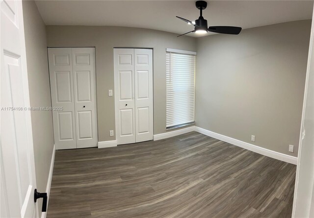 1640 NW 93rd Ave Unit 306, Pembroke Pines, FL 33024 - hallway with baseboards and dark wood-style floors
