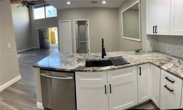 1640 NW 93rd Ave Unit 306, Pembroke Pines, FL 33024 - kitchen with washer / clothes dryer, appliances with stainless steel finishes, a barn door, baseboards, and dark wood-style floors